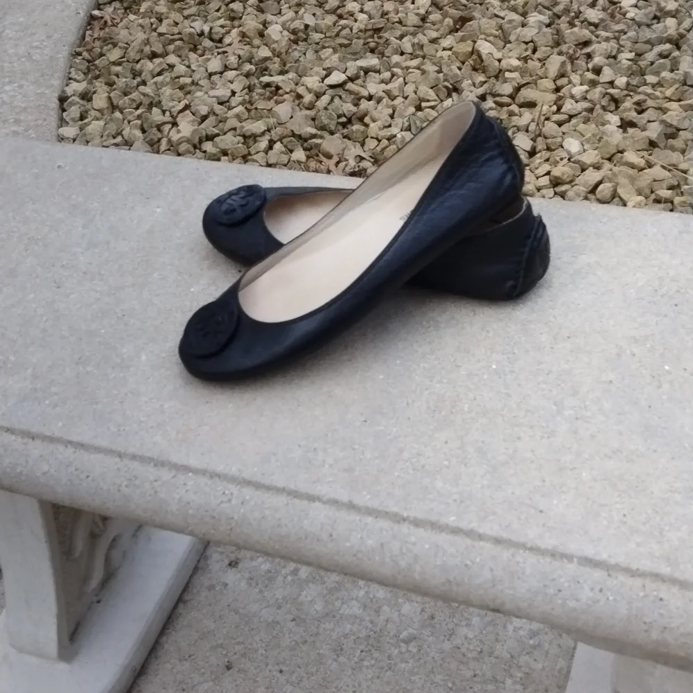 Michael Kors black leather flats with MK logo. Size 7.5